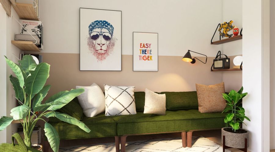 Dunkelgrüne Couch mit Jungle Boho Deko