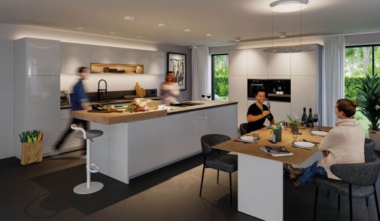 Moderne Wohnküche mit indirekter LED-Beleuchtung an Küchenzeile und Oberschränken