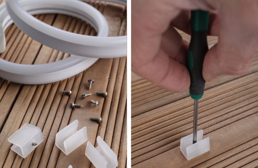 Hand schraubt Kunststoffhalterung für LEDs in Holz