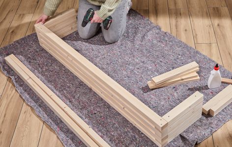 Bank Stueck fuer Stueck aufbauen