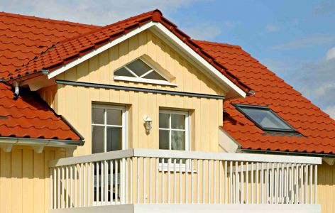 Holzhaus mit Balkon