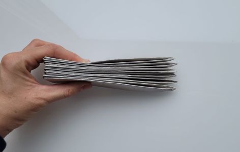 Papierstern Spitzen aufeinander gefaltet